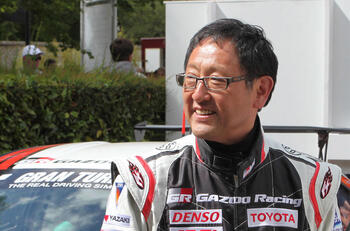 akio toyoda in racing suit